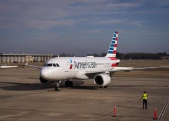An American Airlines plane taxis to a gate after the FAA lifted a ground stop at Bill and Hillary Clinton National Airport (LIT) in Little Rock, Arkansas, US, on Wednesday, Jan. 11, 2023. Airlines began resuming flights after a system outage led US authorities to temporarily ground planes nationwide early Wednesday, a dramatic disruption to the air-traffic system expected to cause ongoing delays and cancellations. Photographer: Al Drago/Bloomberg
