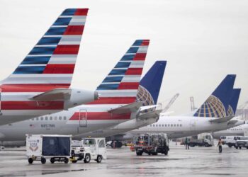 American Airlines and United Airlines airplanes at the Terminal A at Newark Liberty International Airport (EWR) in Newark, New Jersey, US, on Thursday, Jan. 12, 2023. The new terminal will see an Photographer: Aristide Economopoulos/Bloomberg