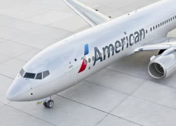 An American Airlines plane sits on the tarmac