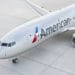 An American Airlines plane sits on the tarmac