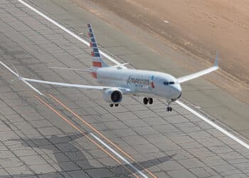 An American Airlines plane lifts off