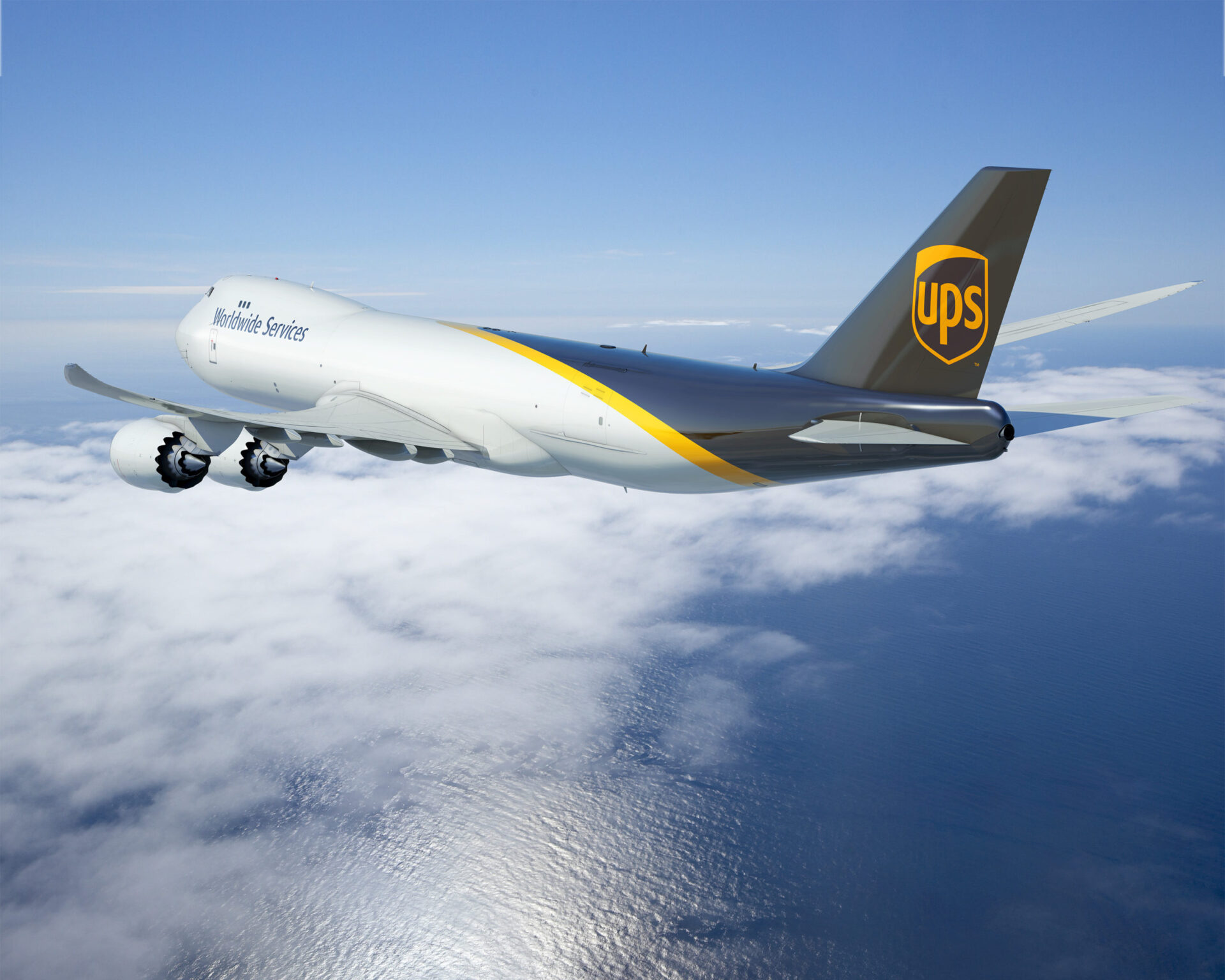 A UPS plane flies through the air