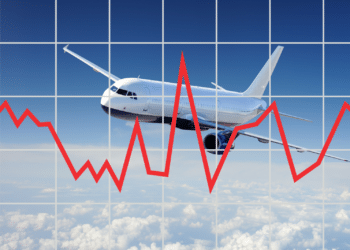 An airplane in the sky with a grid and line chart superimposed over it